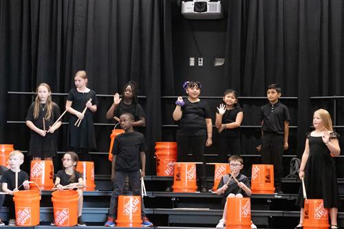 Students with buckets